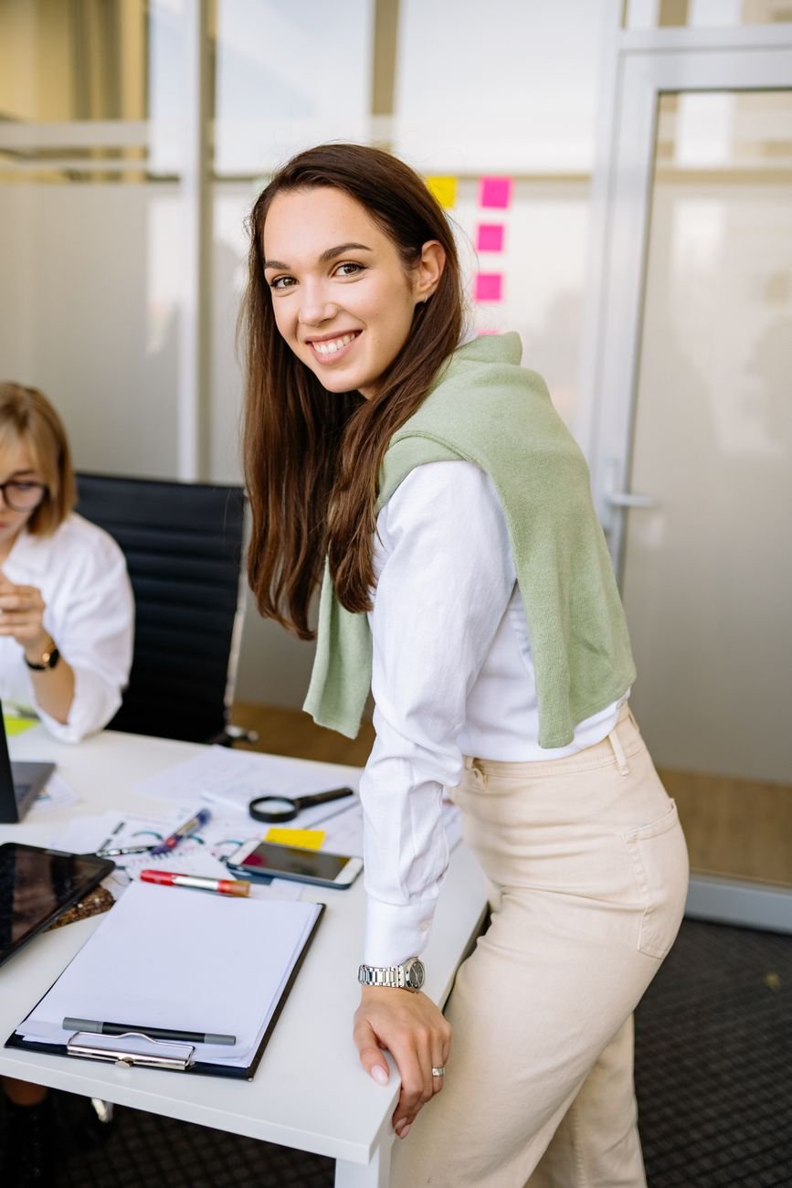 Confident young woman smiling warmly — representing the people Vantage Advocacy fights for